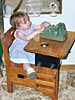 Playing at the desk at Great Grandma's house