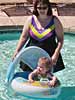 Playing in the pool with Mommy