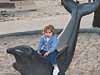 Sitting on a seal statue
