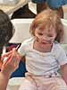 Getting my face painted like a kitty cat